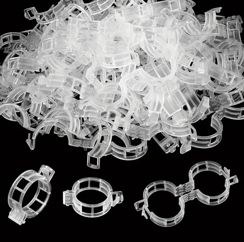 Durable 100pcs plant support clips for tomatoes, vines & vegetables. Easy snap-on, reusable, weather-resistant trellis ties. Buy online in Pakistan.