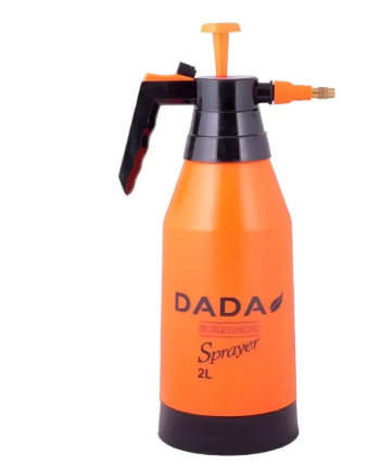 Orange spray bottle with black nozzle