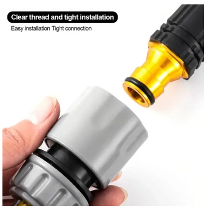 Close-up of a white fitting being attached to a gold and black fitting.